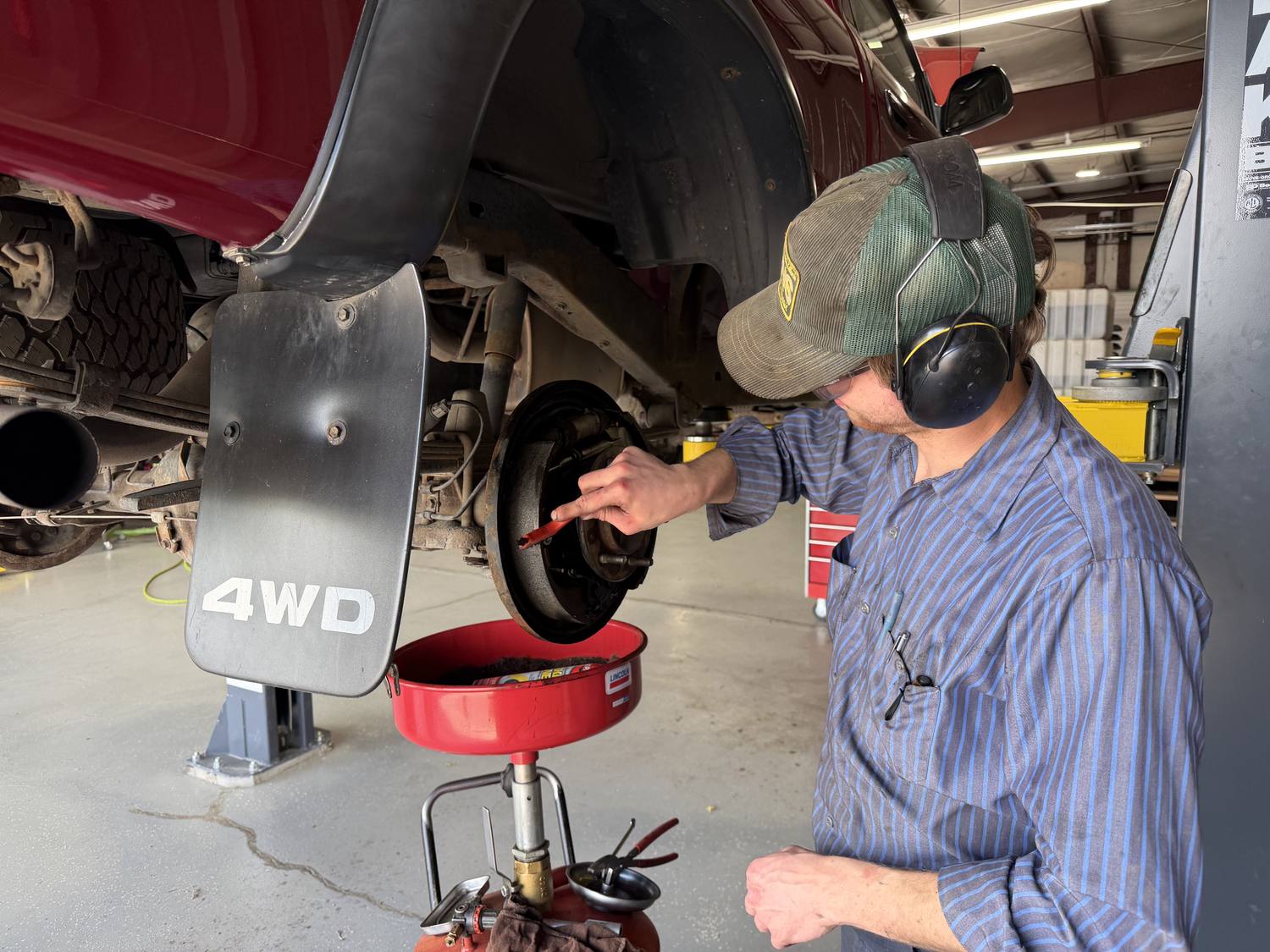 Master Technician technician performing brake repair on a Toyota in Missoula