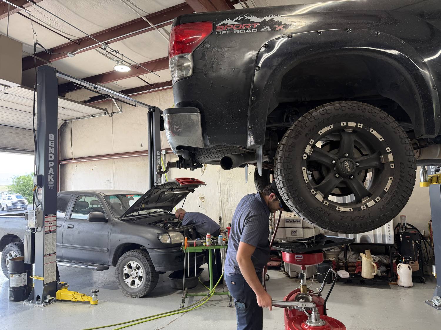 Master Technician technicians servicing Toyota trucks in the service bays in Missoula, MT